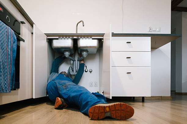 Professional Drain Cleaning technician working in Branchville, VA